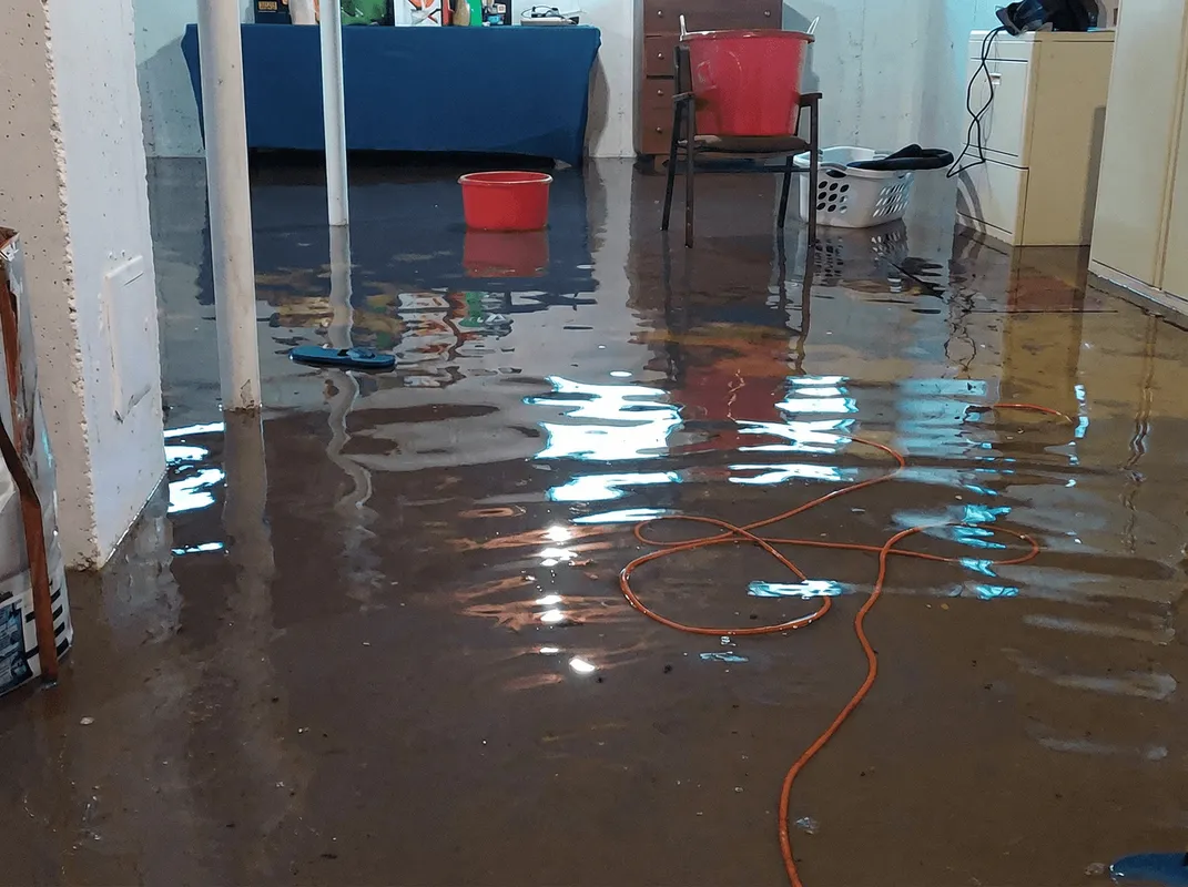 Basement with boiler, cabinets and washing machine completely flooded in Green Bay, WI